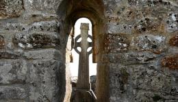 Celtic Cross in ancient wall